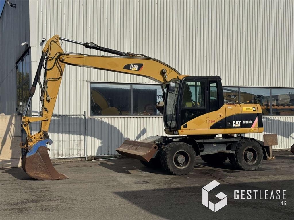 CAT M313D