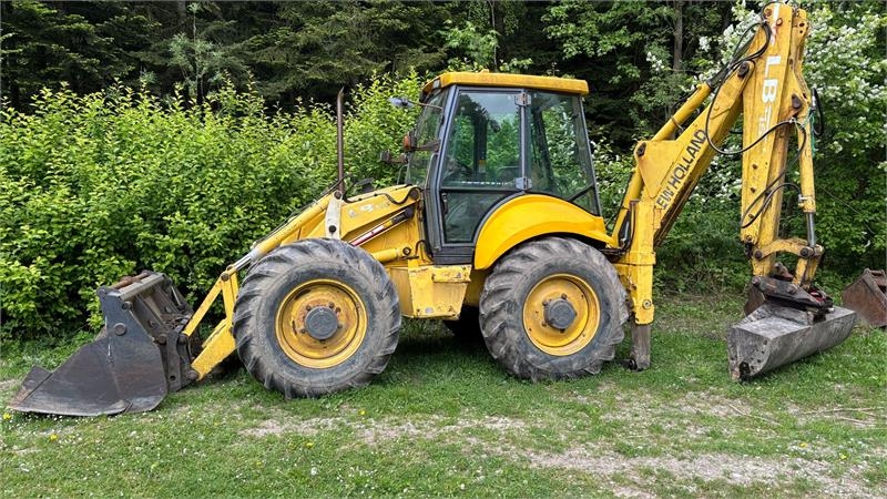 New Holland LB115B-4PS SS med flytbar grave plasering