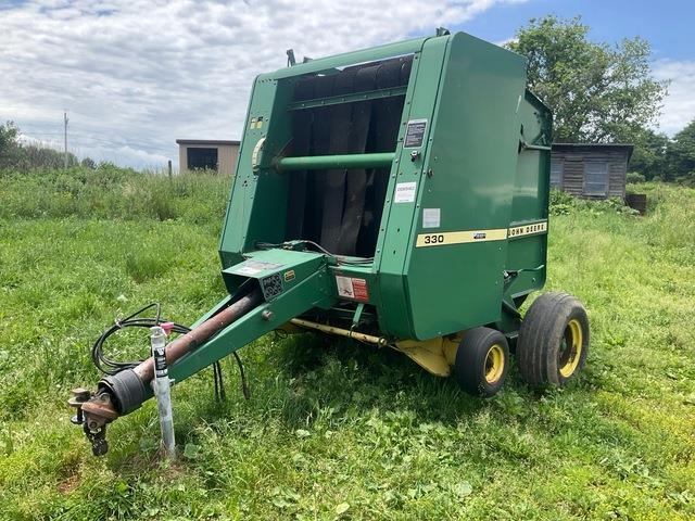 Presse à balles rondes John Deere 330 — occasion 1987