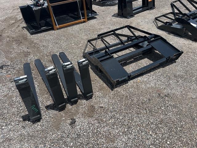 Quantity of (2) 48 in Skid Steer Forks (Unused)