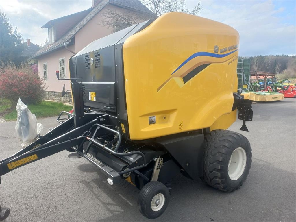 Presse à balles rondes New Holland Roll Bar 125 — occasion 2026