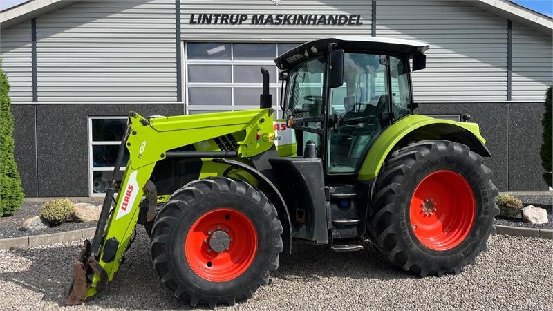 CLAAS Arion 610 Med frontlæsser
