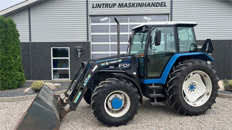 New Holland 7740 SLE med frontlæsser