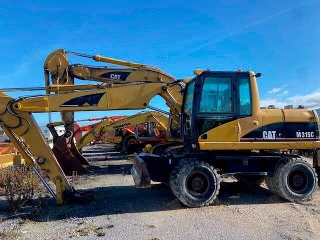 Pelle sur pneus Caterpillar M315C — occasion