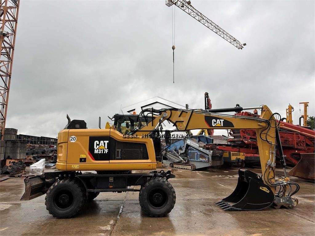 Pelle sur pneus Caterpillar M 317 F — occasion 2019, 9 841 h