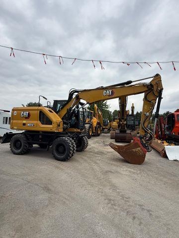 Pelle sur pneus Caterpillar M314 -07 A — occasion 2021, 2 617 h