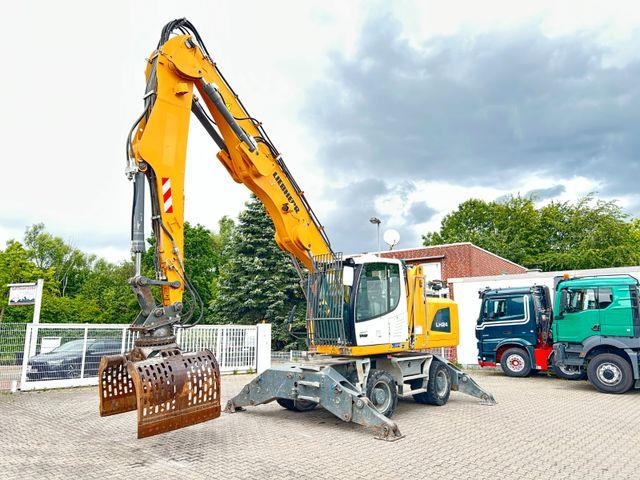 Pelle sur pneus Liebherr LH 24 Litronic mit Abbruch- / Sortiergreifer — occasion 2019, 10 261 h
