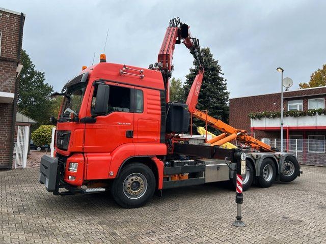 Camion plateau grue MAN 35.500 TGS Abroller mit Fassi F315RA.2.26 Kran — occasion 2017