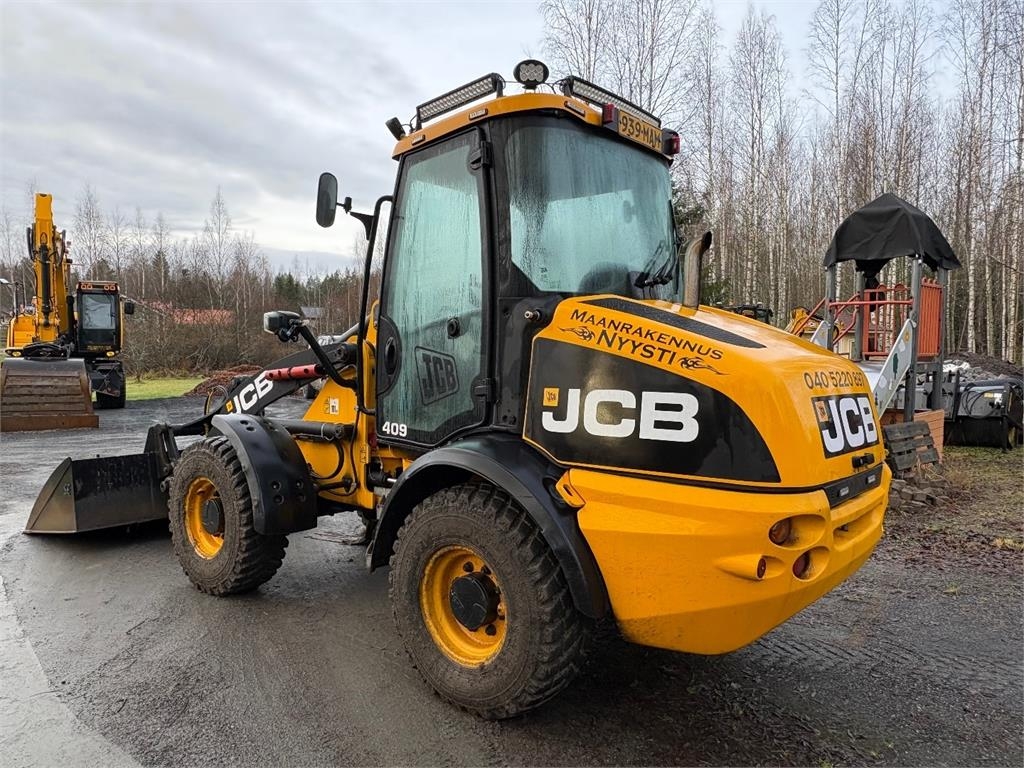 JCB 409 *VAIN 2864h* Nivelaura, kaksi kauhaa saatavill