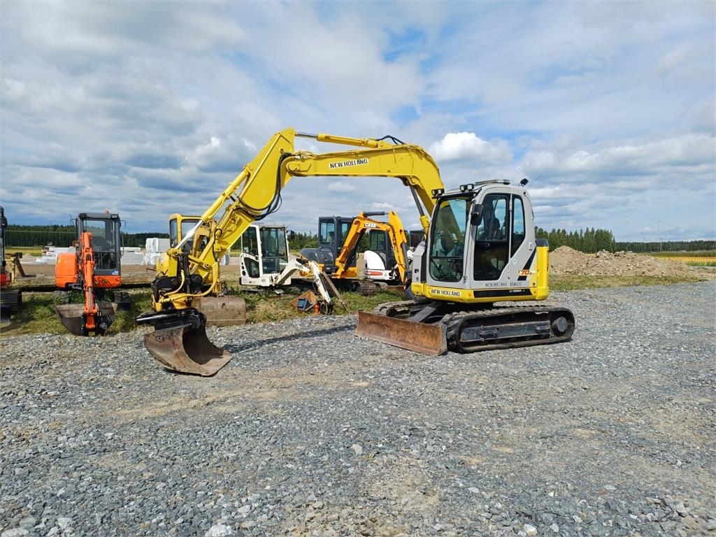 New Holland E70BSR-2 pihti engconilla