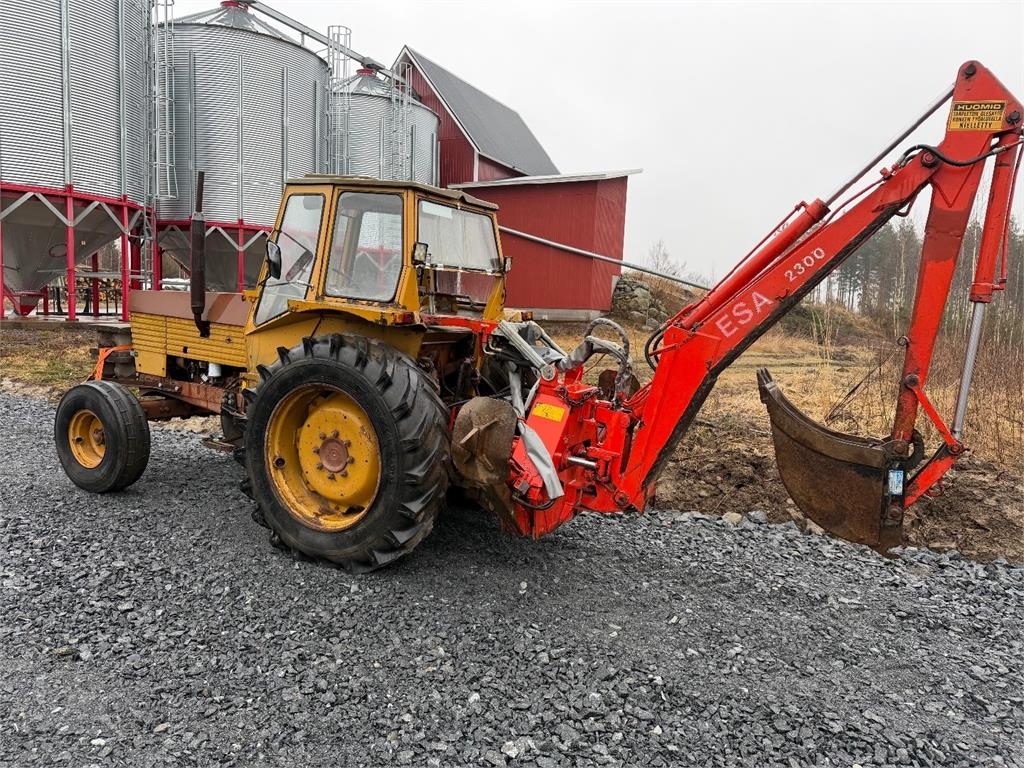 Valmet 702 HUOM TUPPISOVITTEISELLA KAIVURILLA 2x kauha