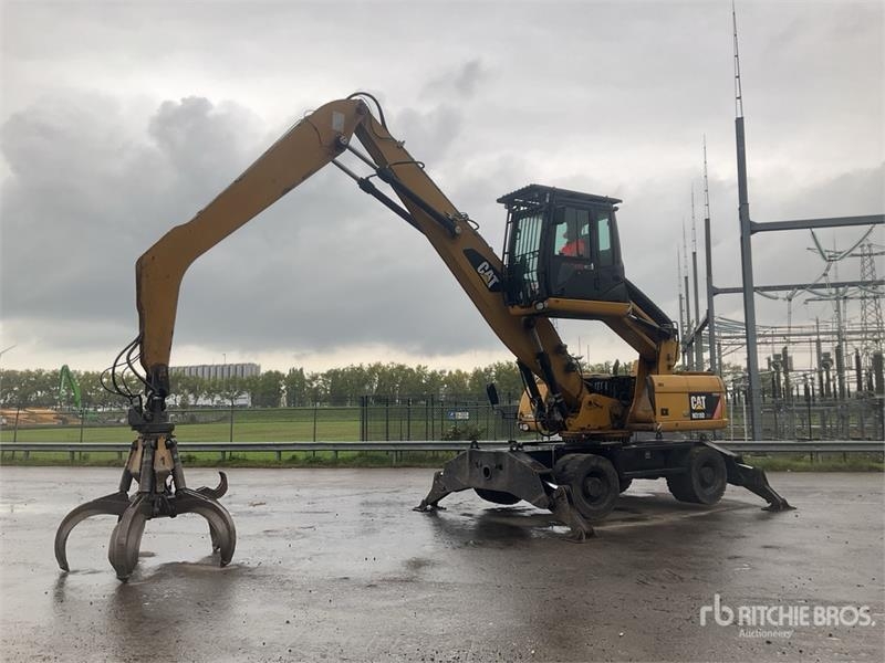 Caterpillar M318D MH Wheel Material Handler — occasion 2010, 8 648 h