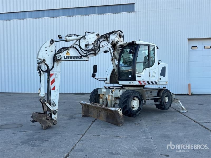 Pelle sur pneus Liebherr A 914 Compact Pelle Sur Pneus Wheel — occasion 2015, 12 500 h