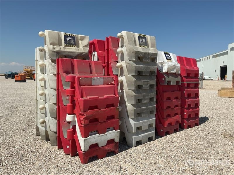 Quantity of (60) Filled New Jersey Barriers Road S