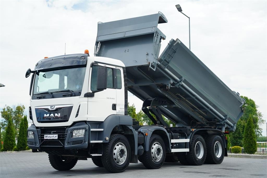 Camion benne MAN TGS 35.420 / 8X4 / WYWROTKA 2 STRONNA - 6 M / HYDR — occasion 2018