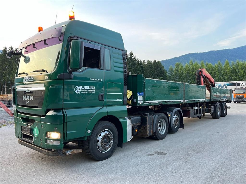 MAN TGX 26.440 6x2 + Flatbed semi trailer + Crane PK26