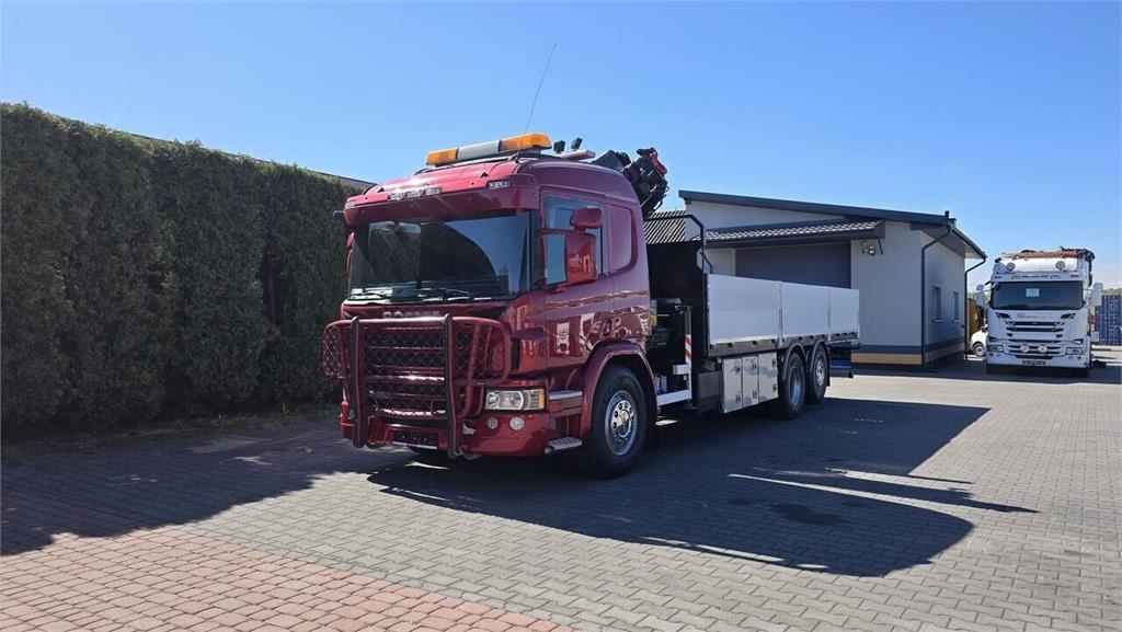 Scania P410 flatbed truck + Crane