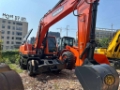 Pelle sur pneus Doosan DH 210 W-7 — occasion 2022