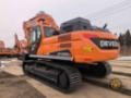 Pelle sur chenilles Develon DX 300 LC — occasion 2026