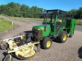 Tracteur agricole John Deere 670 mit Mähwerk und Grasaufnahme — occasion, 3 710 h
