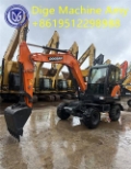 Pelle sur pneus Doosan DX60W-9C — occasion 2022, 800 h