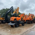 Pelle sur pneus Doosan DX60W-9C — occasion 2023, 1 430 h
