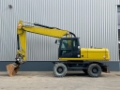 Pelle sur pneus Caterpillar M322D — occasion 2011, 11 459 h