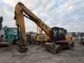 Pelle sur pneus Caterpillar M322D — occasion 2013, 10 050 h