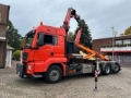 Camion plateau grue MAN 35.500 TGS Abroller mit Fassi F315RA.2.26 Kran — occasion 2017