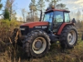 Tracteur agricole New Holland M135 4WD, Suurteholinko, Paripyörät, Etulevy — occasion 1998