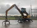 Caterpillar M318D MH Wheel Material Handler — occasion 2010, 8 648 h