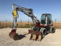Pelle sur pneus Takeuchi TB175W — occasion 2004, 8 857 h