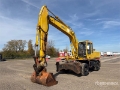 Pelle sur pneus John Deere 595D — occasion 1990, 10 540 h