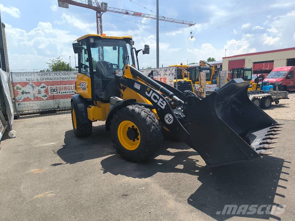 JCB 409 لوادر بعجل