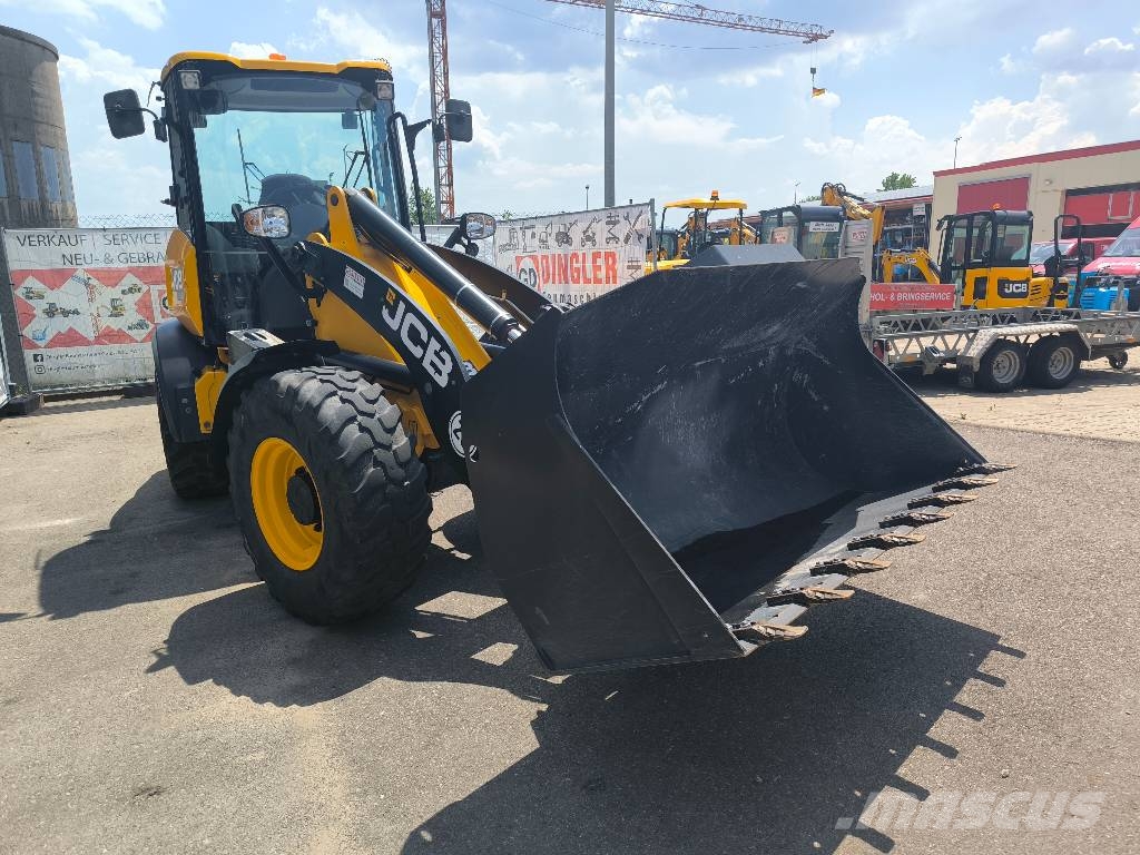 JCB 409 لوادر بعجل