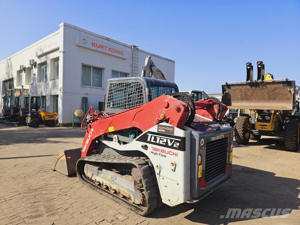 Takeuchi TL12 لوادر زحافة
