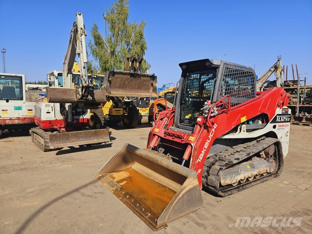 Takeuchi TL12 لوادر زحافة
