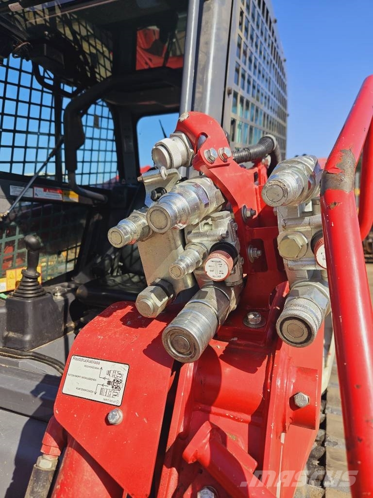 Takeuchi TL12 لوادر زحافة