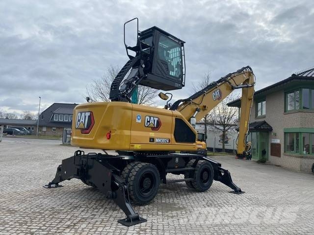 CAT MH 3024-07D ULM MIETE / RENTAL (12002224) Bagri za prekladanje primarnih/sekundarnih surovin