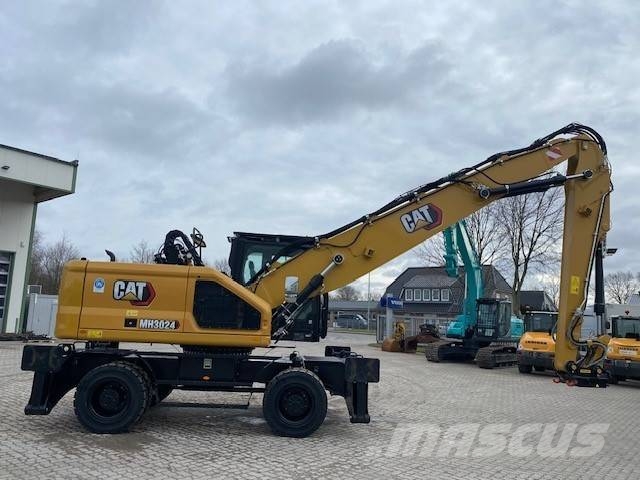 CAT MH 3024-07D ULM MIETE / RENTAL (12002224) Bagri za prekladanje primarnih/sekundarnih surovin