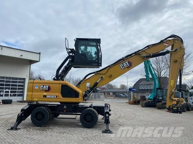 CAT MH 3024-07D ULM MIETE / RENTAL (12002224) Bagri za prekladanje primarnih/sekundarnih surovin