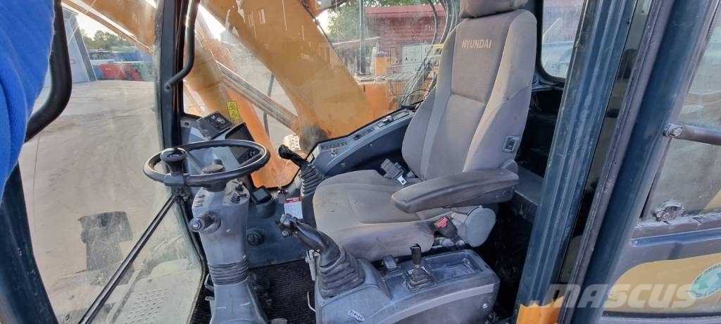 Hyundai Robex 140 W-9 حفارات بعجل