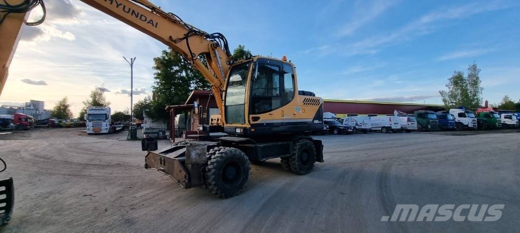 Hyundai Robex 140 W-9 حفارات بعجل