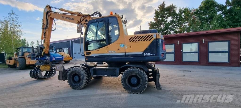 Hyundai Robex 140 W-9 حفارات بعجل