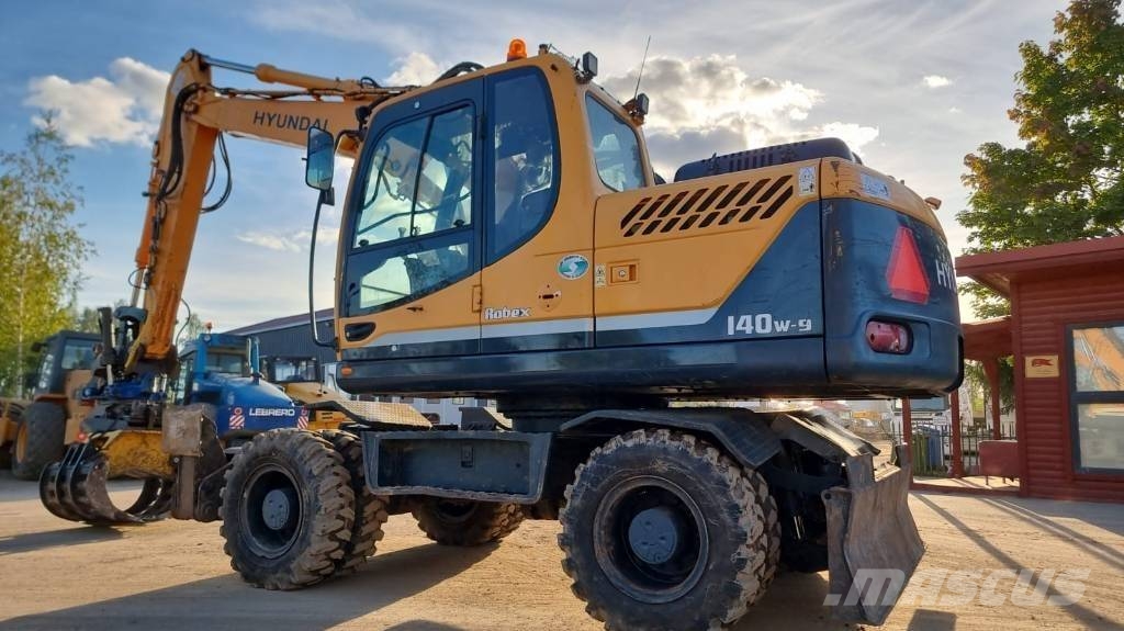 Hyundai Robex 140 W-9 حفارات بعجل