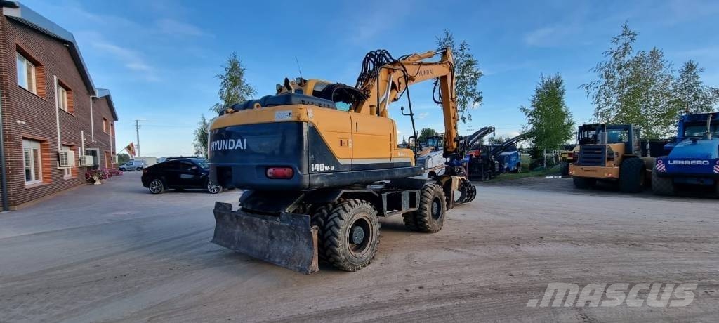 Hyundai Robex 140 W-9 حفارات بعجل