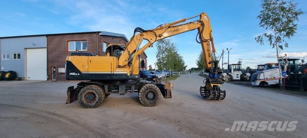 Hyundai Robex 140 W-9 حفارات بعجل