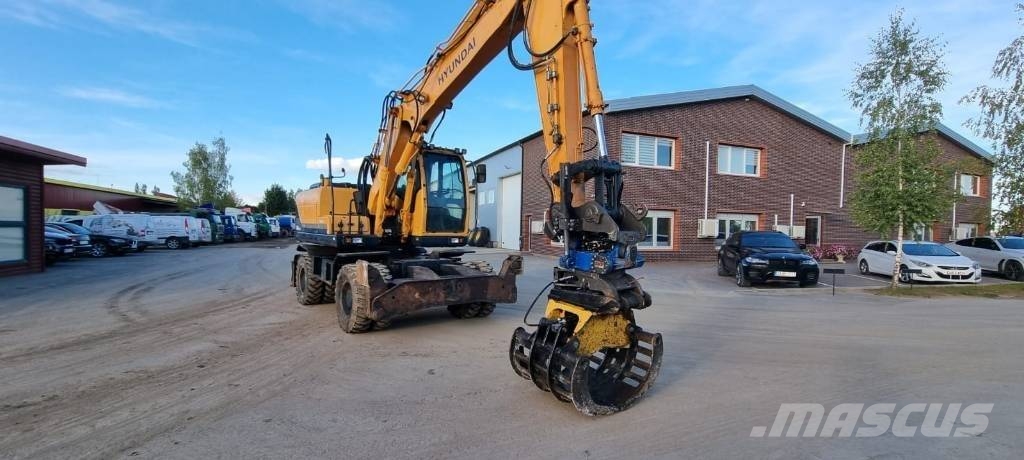 Hyundai Robex 140 W-9 حفارات بعجل