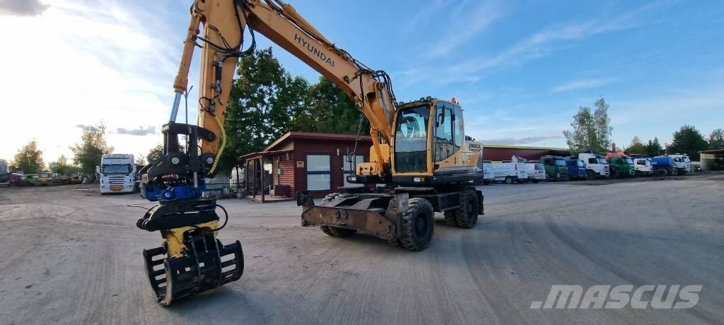 Hyundai Robex 140 W-9 حفارات بعجل