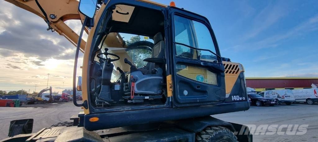 Hyundai Robex 140 W-9 حفارات بعجل